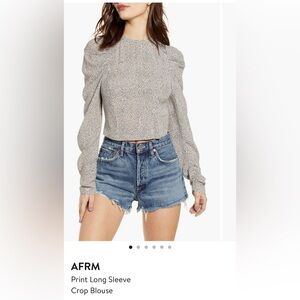 AFRM long sleeve crop blouse. Tiny leopard print. Size L. Slight puff shoulder.